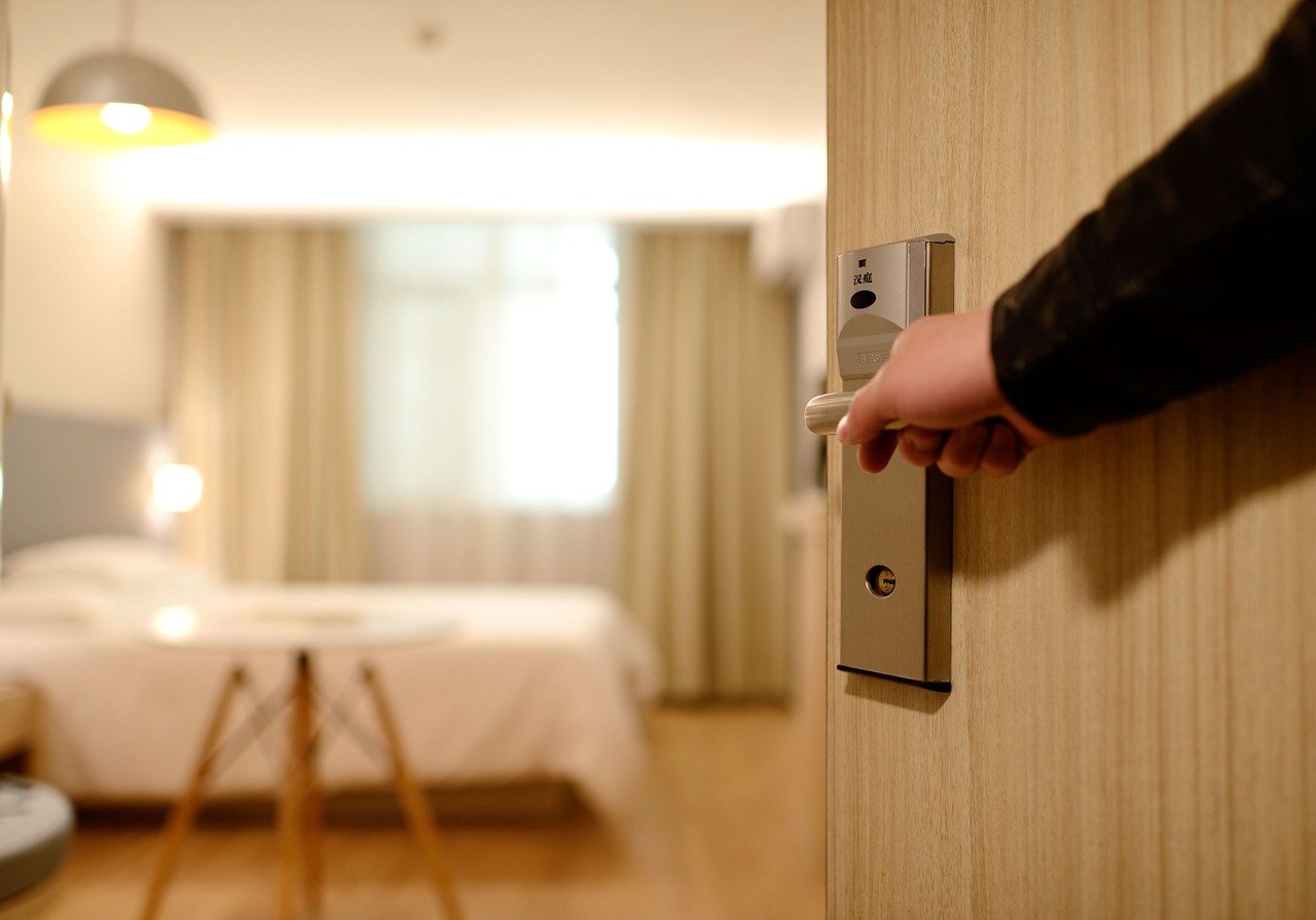 hotel motel room bed
